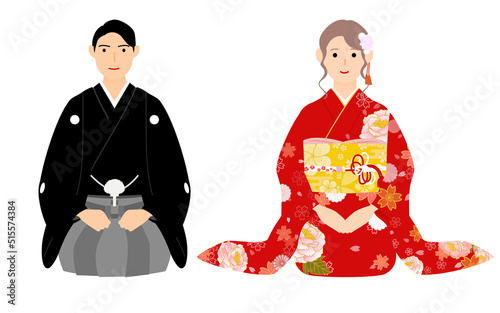 新年の挨拶をする男性と女性、着物姿（紋付袴と振袖）で正座