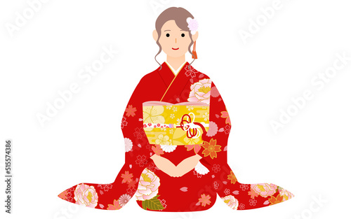 新年の挨拶をする女性、着物姿（振袖）で正座