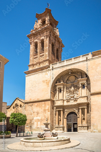 View at the Church La Asuncion with fountain in the streets of  Almansa in Spain photo