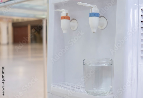a drinking glass is placed on the cooler