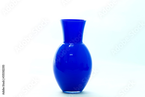 Vase with flowers photographed on a white background