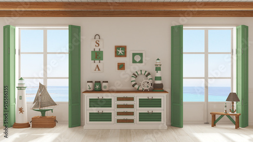 Marine style, living room with wooden and rattan chest of drawers in white and green tones. Panoramic windows with sea landscape. Parquet floor. Nautical interior design photo