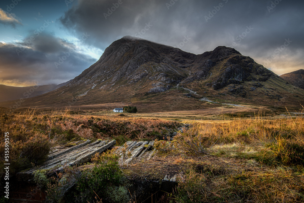 Looking towards the Lagangarbh mountain hut in Glen Coe  with the peaks of Buachaille Etive Mor in the background. Scottish Highlands - obrazy, fototapety, plakaty 
