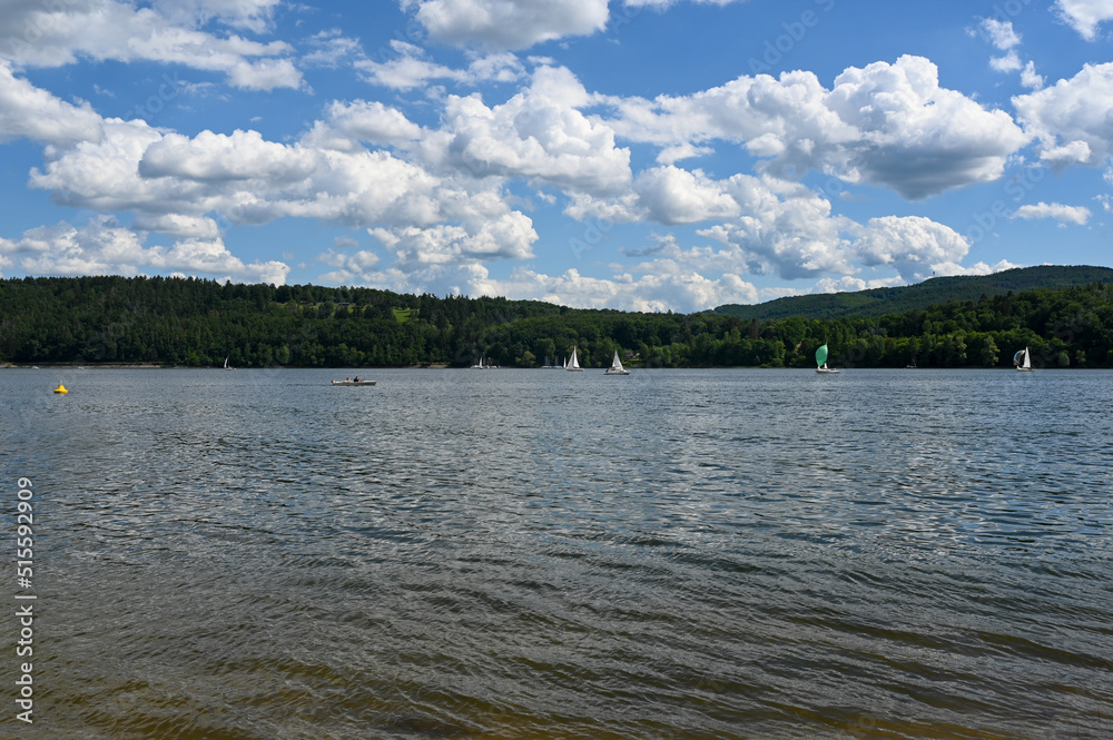View of the lake Eder with sailing boats and blue sky