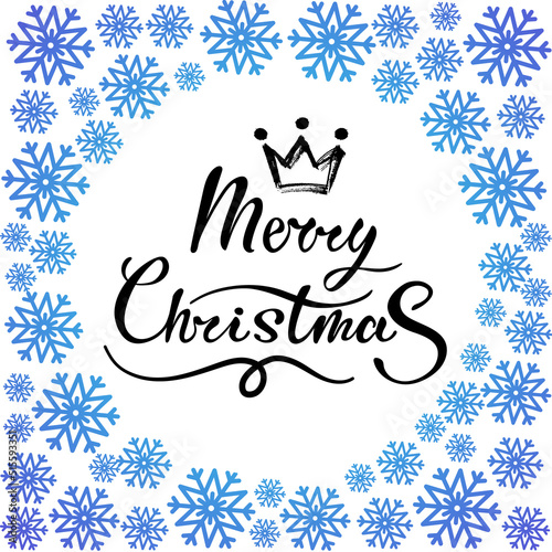 Merry Christmaslettering surrounded with snow photo