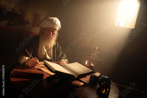 Historical Scene While An Islamic Scientist is Reading photo