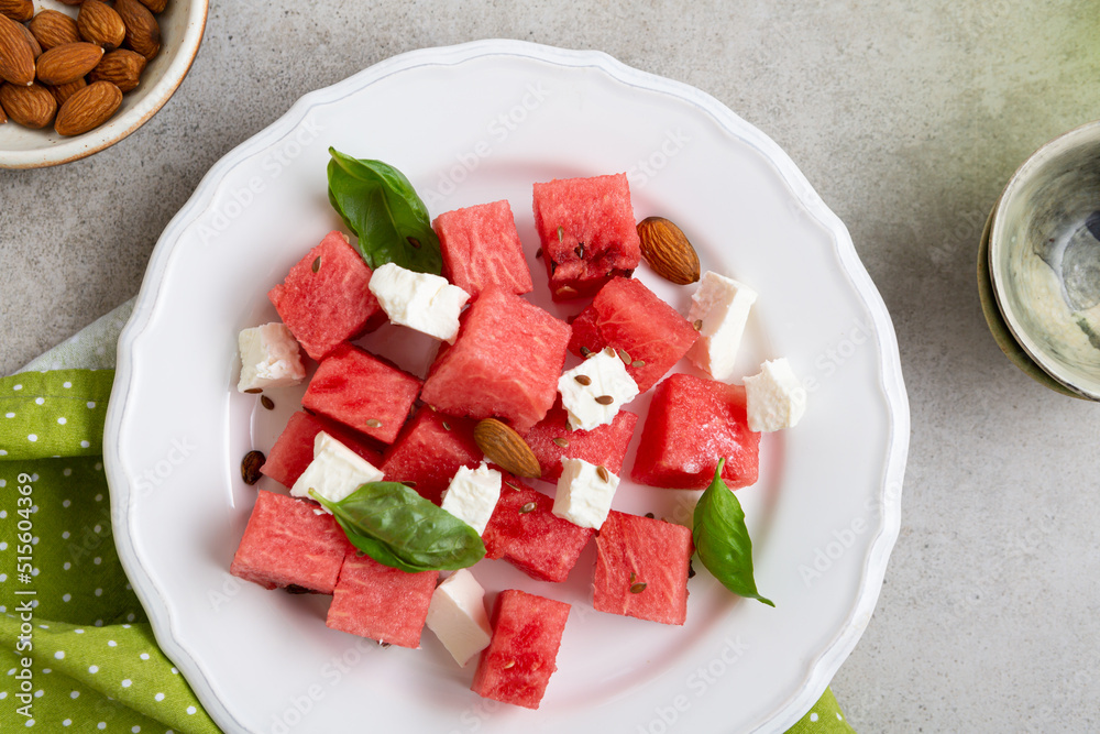 Healthy summer watermelon feta cheese salad on white plate