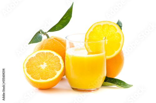 Glass of orange juice and slices of orange fruit and leaves isolated on white background