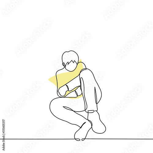 man lay down in an embrace with a pillow - one line drawing vector. concept of being sad alone, missing someone, depression, grief
