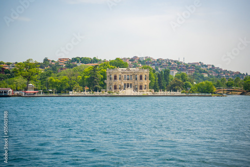 Beautiful palace hotel and sea water over the Golden Horn bay in Istanbul, Turkey