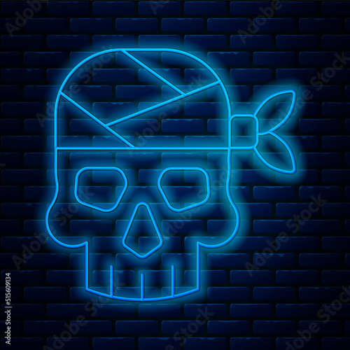 Glowing neon line Pirate captain icon isolated on brick wall background. Vector