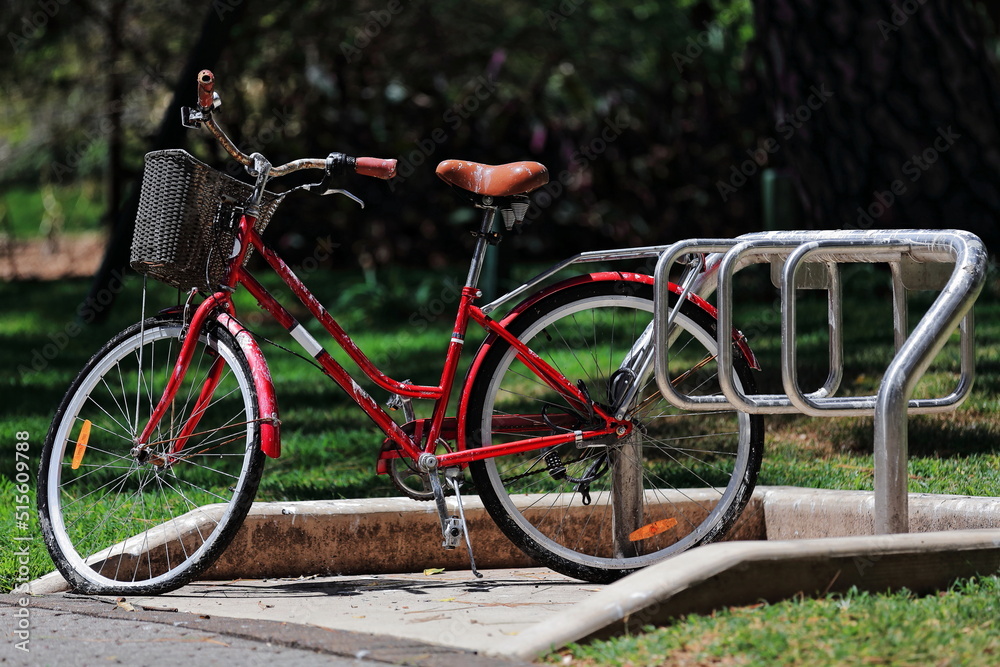 Red utility bicycle long stopped in City Botanic Gardens. Brisbane-Australia-040