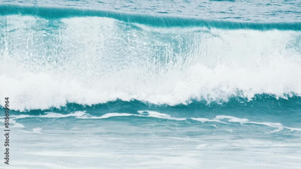 Ocean wave breaks on the shore Ocean wave breaks on the shore
