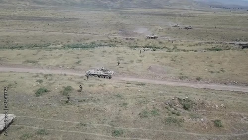 The advance of government troops on Deir ez-Zor, armored vehicles are attacking militants of the Islamic State. Syria, Deir ez-Zor Governorate. It is located on the right bank of the Euphrates River. photo