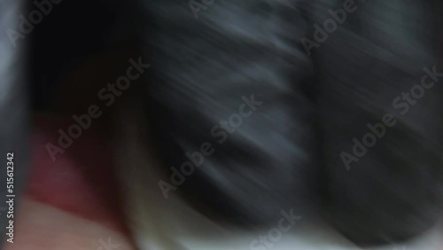 Lips are wiped with a cotton pad.Macro photography.Black background.