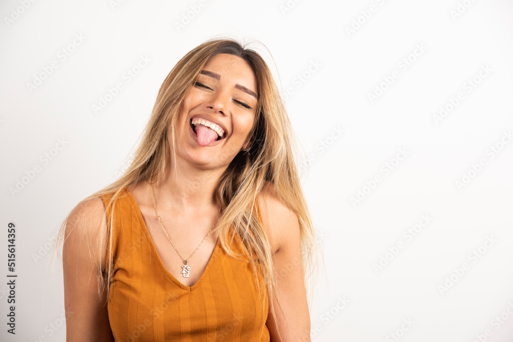 Positive woman posing on white background Positive woman posing on white background