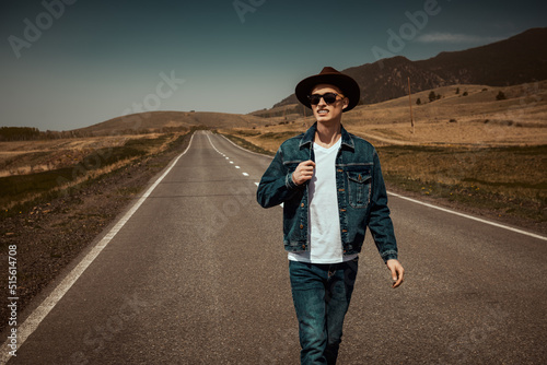 traveler walking on highway © Andrey Kiselev