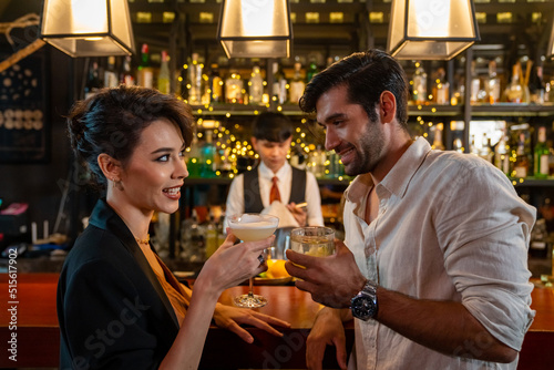 Sticker Caucasian man and woman flirting each other while hangout nightlife party at restaurant bar