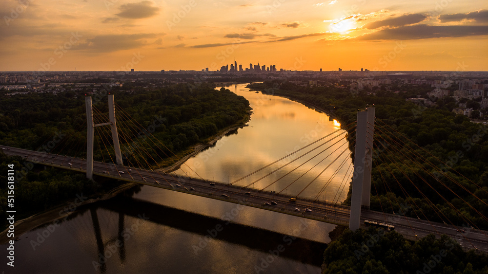 Południowa część miasta Warszawa - Zachód słońca z mostem Siekierowskim  - obrazy, fototapety, plakaty 