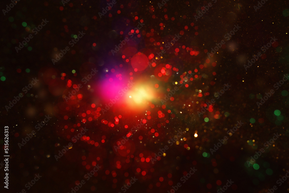 background of abstract red, gold and black glitter lights. defocused background of abstract red, gold and black glitter lights. defocused