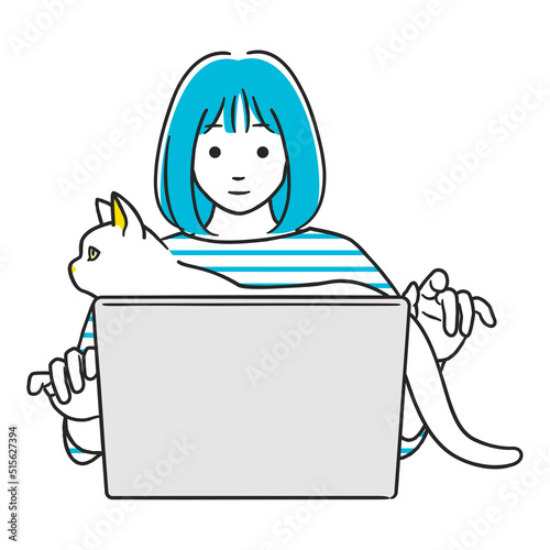 パソコン作業中、猫に邪魔される女性