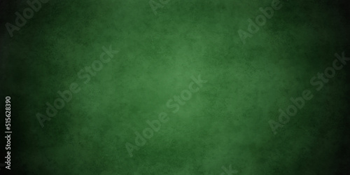 Backdrop grunge green watercolor background with black faded border and panoroma background. old vintage grunge texture, marbled green painted background illustration.	