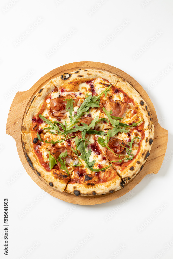 italian pizza with arugula on a white background