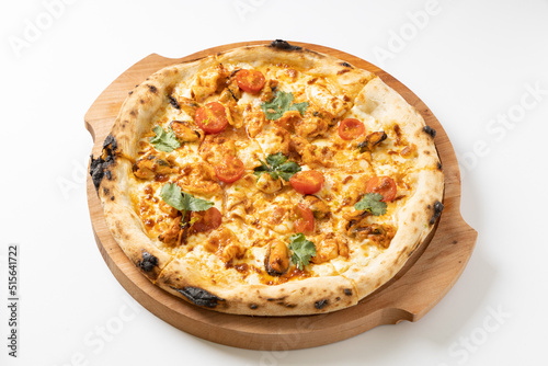 tom yam pizza on a white background
