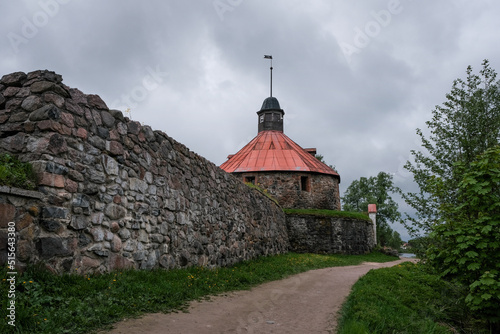 Fortress Korela on cloudy summer day. Priozersk, Leningrad Oblast, Russia. photo