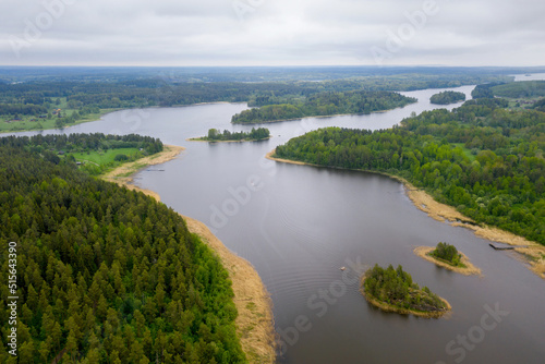 Aerial view of Kavantsalmi strait of Ladoga lake and Kilpola island  on the right  on cloudy summer day. Ladoga Skerries National park  Karelia  Russia.