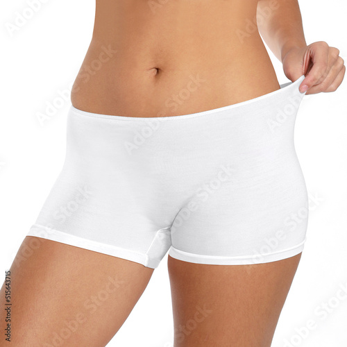 Feeling beautiful. Attractive young woman in underwear smiling while standing against white background.posing in lingerie on a white background ,front view