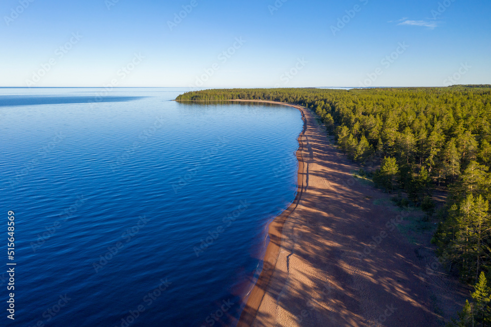 Ladoga lake on sunny summer morning. Vidlitsa village, Karelia, Russia.