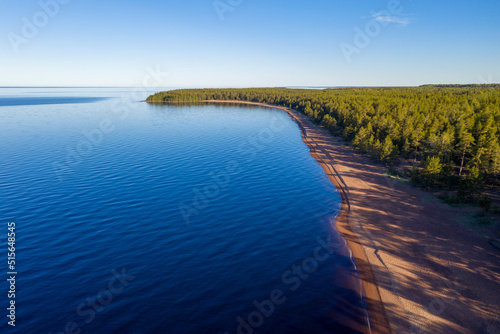Ladoga lake on sunny summer day. Vidlitsa village, Karelia, Russia.