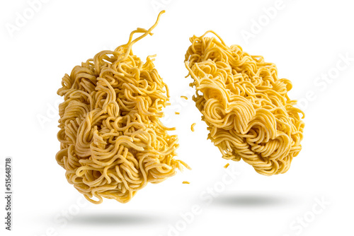 Instant noodles split in half (or divided into two parts) isolated on a white background