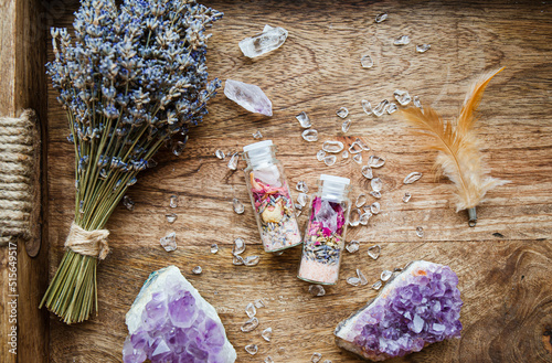 Homemade spell jar bottles with good intentions for home protection and inner balance. Filled with Himalayan rock salt, dried herbs flowers and semi precious stone chips. Magical item.