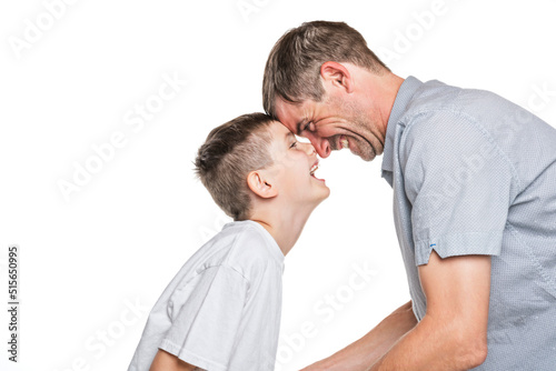 cute 8 year old boy studio portrait on white background with father