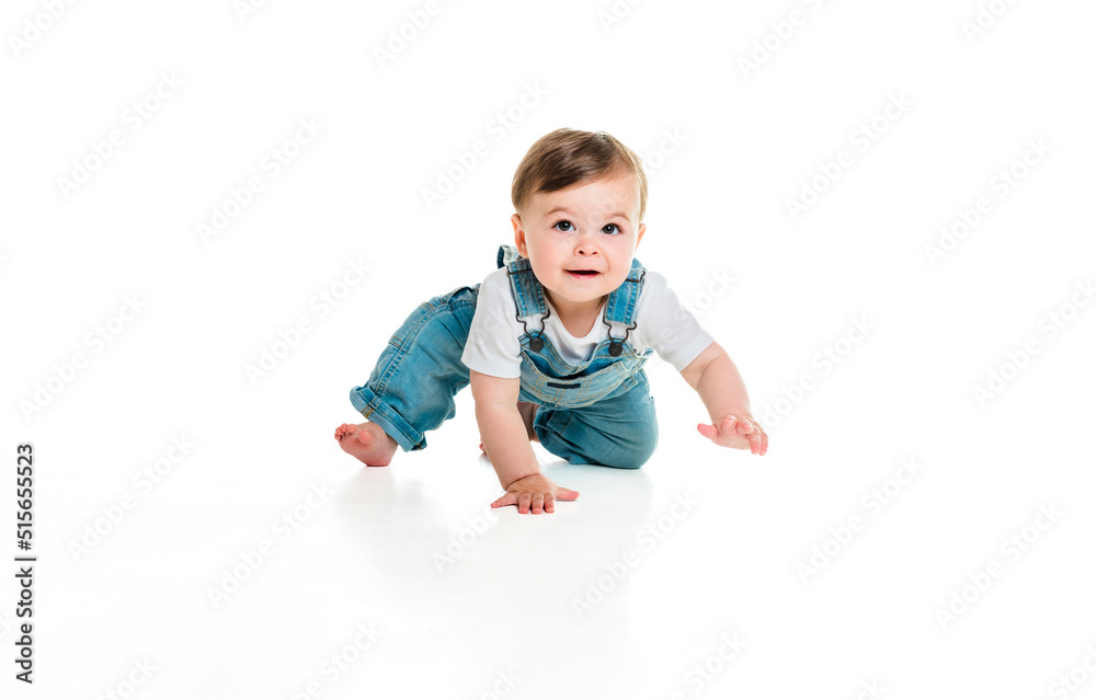 Cheerful baby boy toddler on white studio background Cheerful baby boy toddler on white studio background