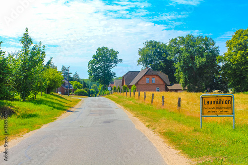 Natural panorama view with farms green plants trees forest Germany. photo