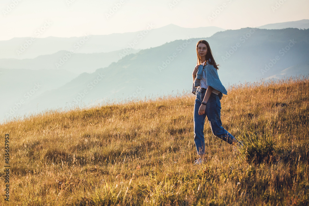 Pretty Teen Girl Walking in Mountain Sunrise Landscape Pretty Teen Girl Walking in Mountain Sunrise Landscape