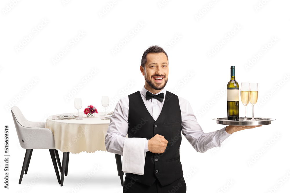Smiling waiter holding bottle of white wine and glasses on a tray Smiling waiter holding bottle of white wine and glasses on a tray
