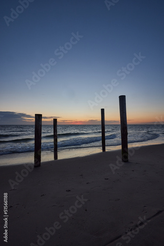 Sunset and reflections on Petten beach