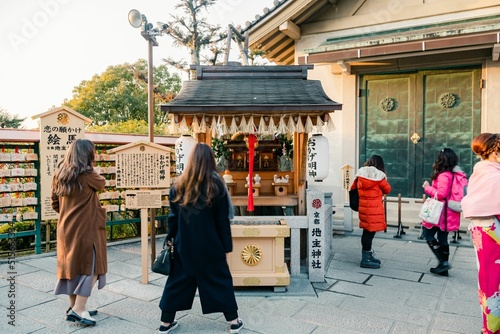 Closeup shot of people near Kiyomizudera temple in Kyoto, Japan photo