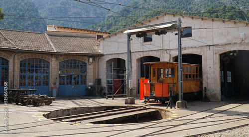 Tram in engine shed with turntable in foreground Soller Mallorca Spain.