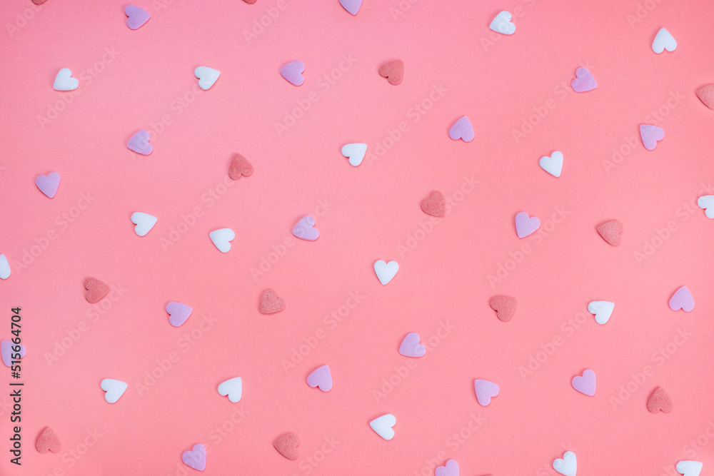background of hearts on a pink background. The concept of love or celebration of a party, anniversary, valentine's day, in pink colors background of hearts on a pink background. The concept of love or celebration of a party, anniversary, valentine's day, in pink colors