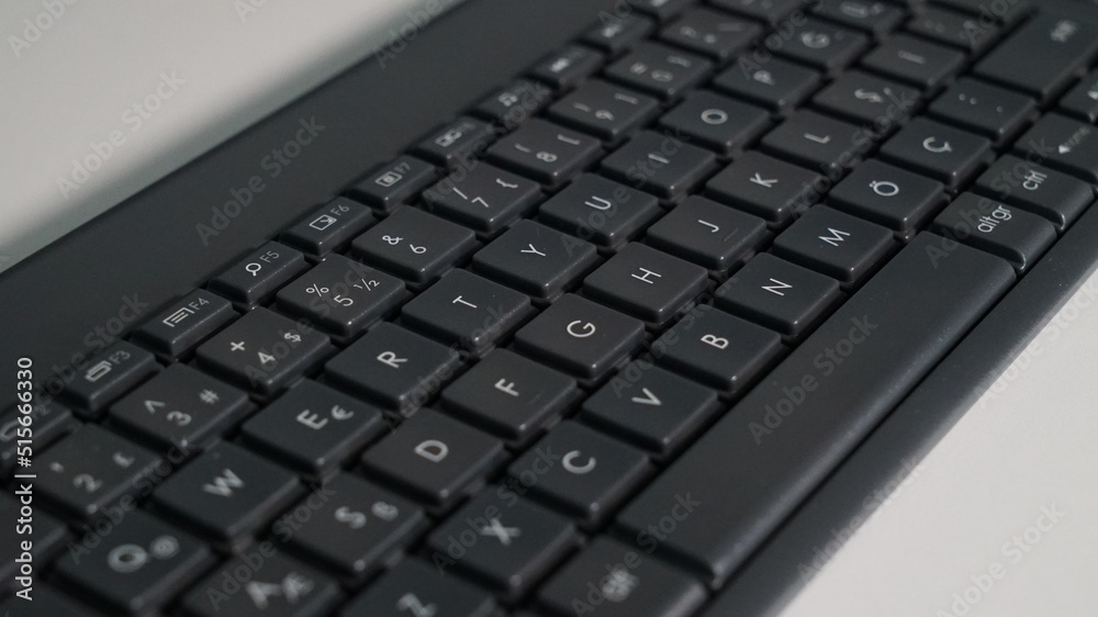 close-up of a black computer keyboard close-up of a black computer keyboard