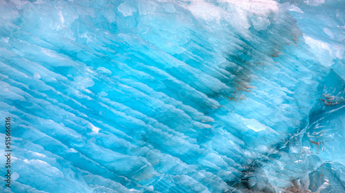 A close-up of the layered surface of a blue glacier - Knud Rasmussen Glacier near Kulusuk - Greenland, East Greenland