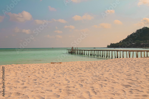 Dreamy summer scene of a wooden boardwalk leading to the vast sea horizon in Koh Rong island in Cambodia  a popular travel destination
