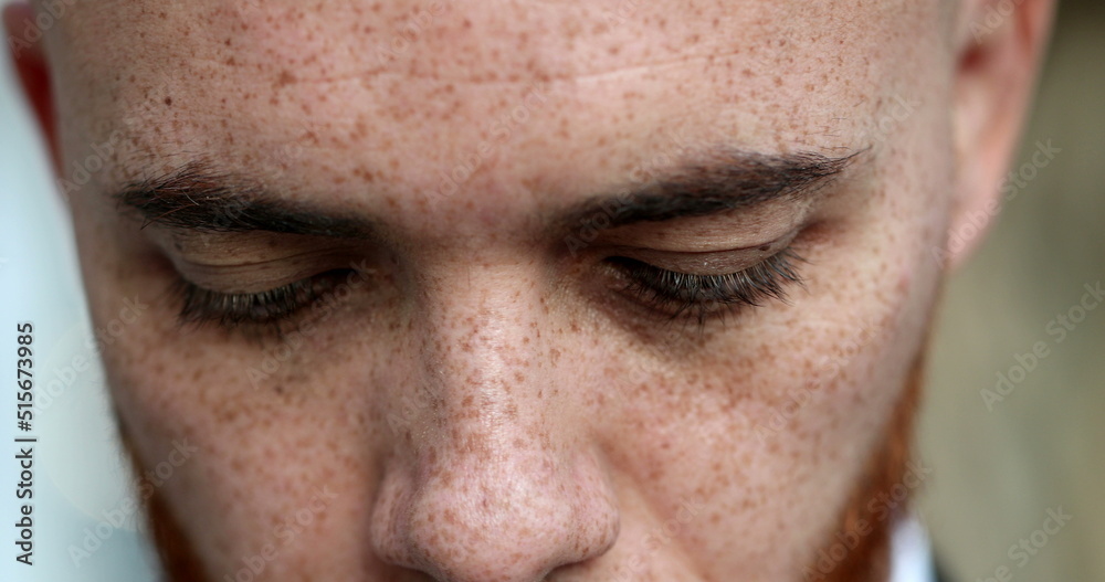 White man opening eyes looking at camera and smiling, close-up portrait face White man opening eyes looking at camera and smiling, close-up portrait face
