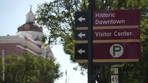 Sign for historic downtown Martinsburg, West Virginia, WV with Berkeley County courthouse in background. photo