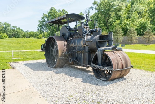 Fotografie, Obraz Vintage steamroller near a park on a sunny day